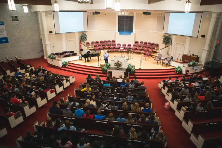 Students gathered in the sanctuary for chapel